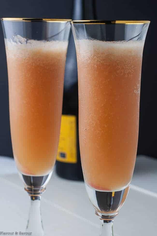 Close up view of two flutes of Rhubarb Bellini Prosecco Cocktail