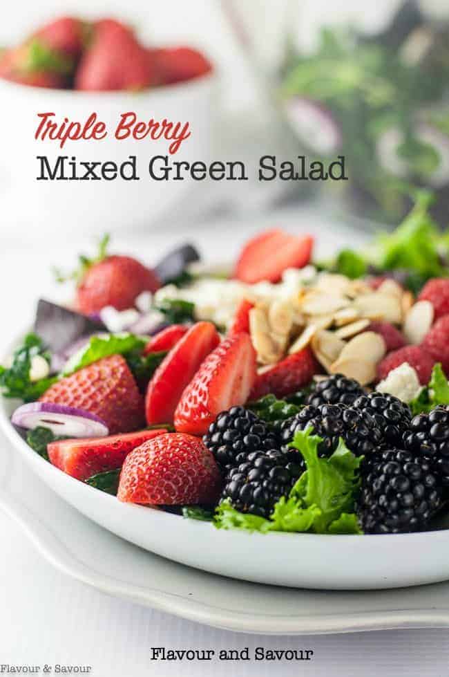 Triple Berry Mixed Green Salad with strawberries, raspberries, and blackberries