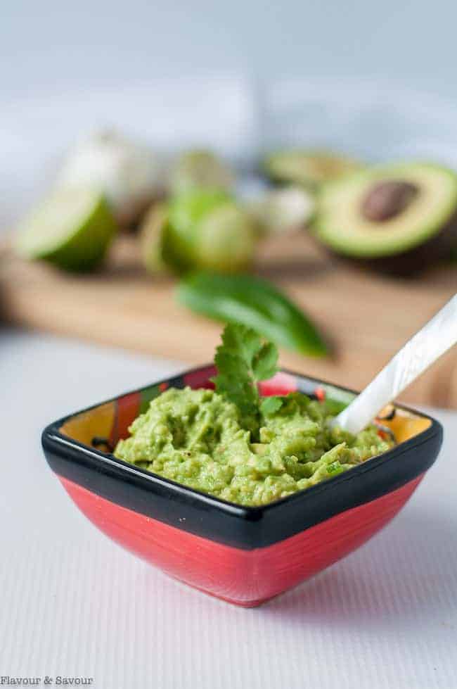 a small dish of Tomatillo Guacamole for Chicken Fajita Burgers