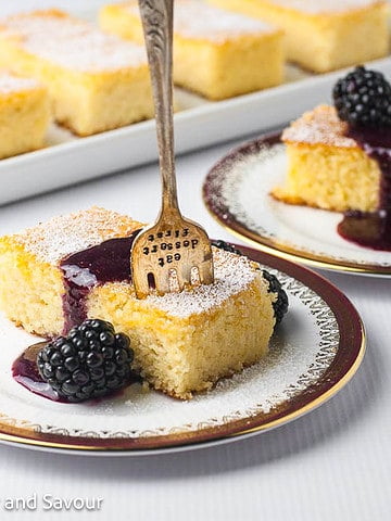 Flourless Lemon Ricotta Cake with blackberry sauce.