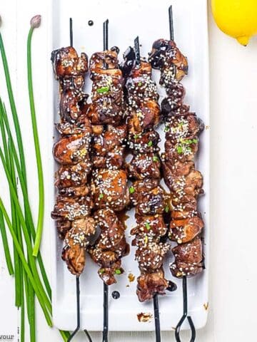 Chicken Yakitori Skewers with chives.