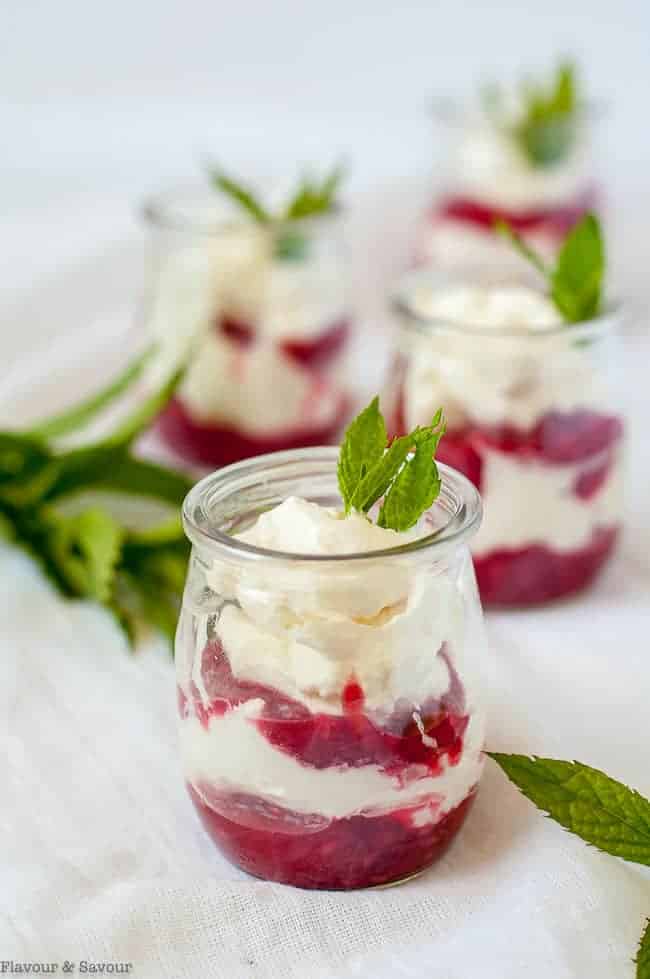 Easy Raspberry Rhubarb Fool in mini dessert cups with fresh mint sprigs.