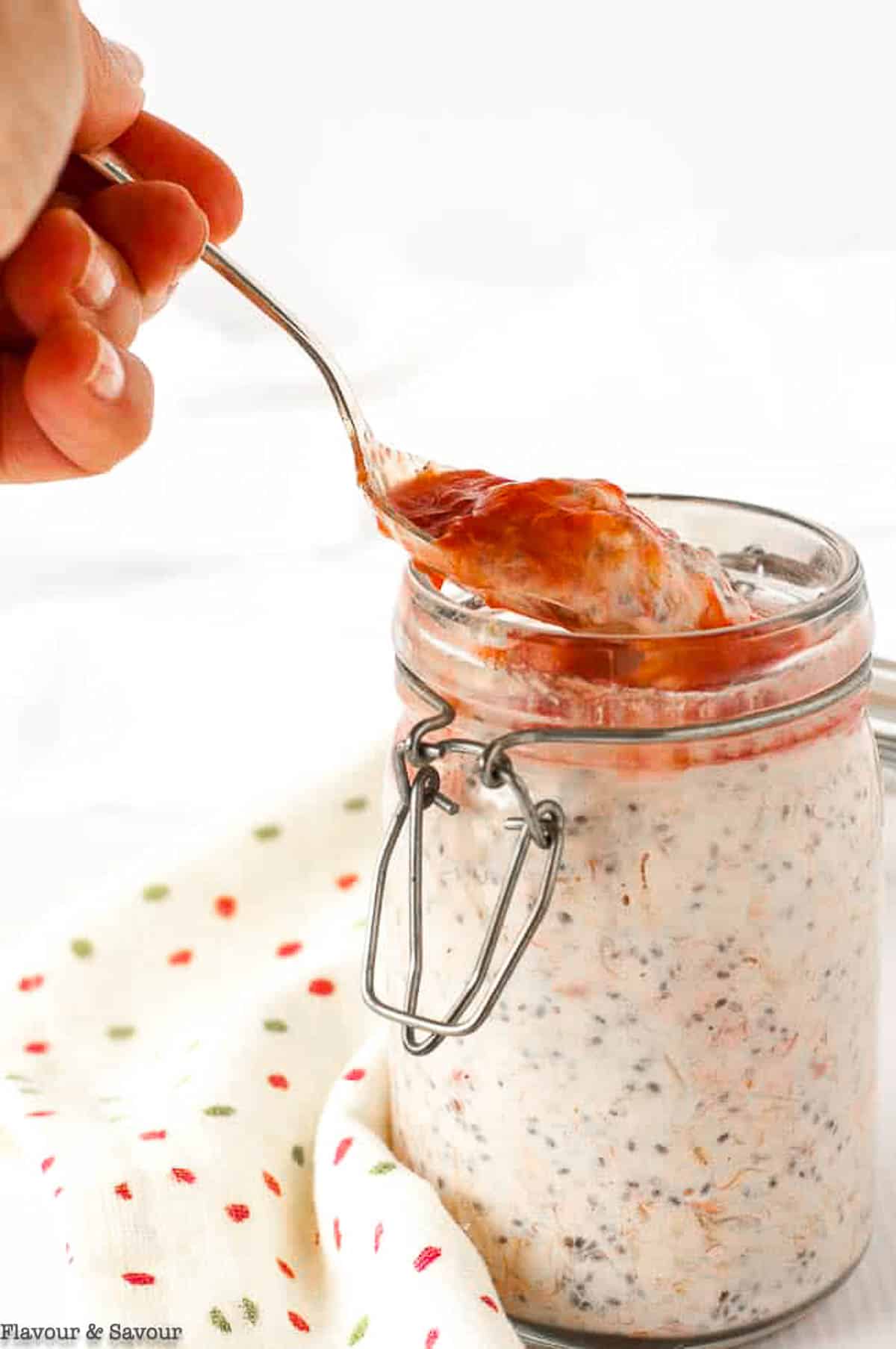 A spoonful of strawberry rhubarb chia overnight oats.