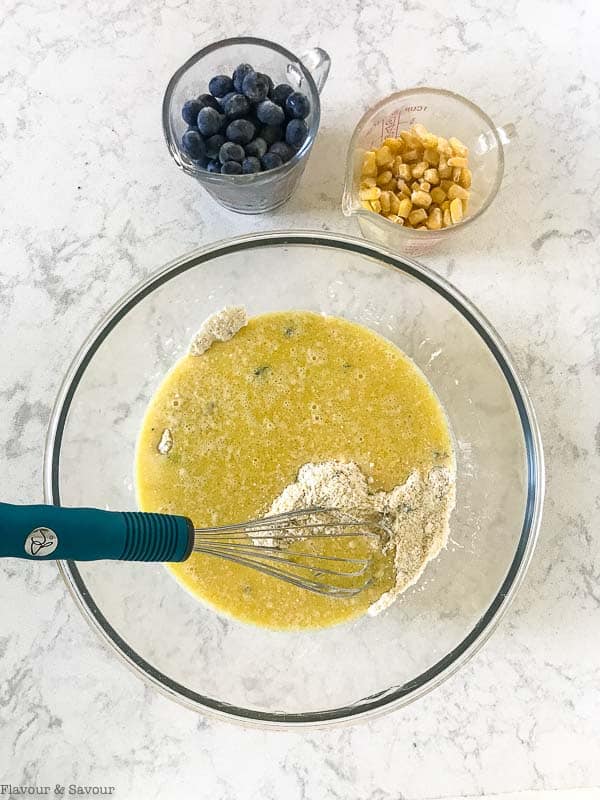 Mixing ingredients for Blueberry Buttermilk Gluten-Free Cornbread Muffins