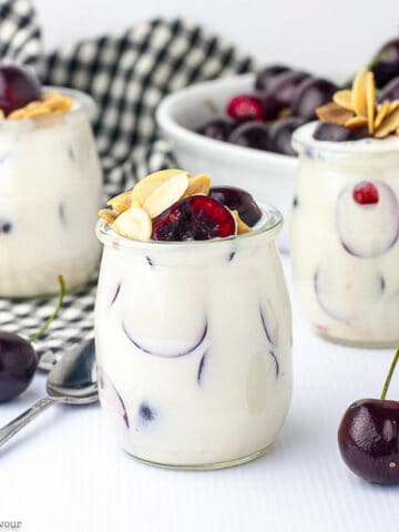 mini glasses of Creamy Cherry Lemon Ricotta Parfait