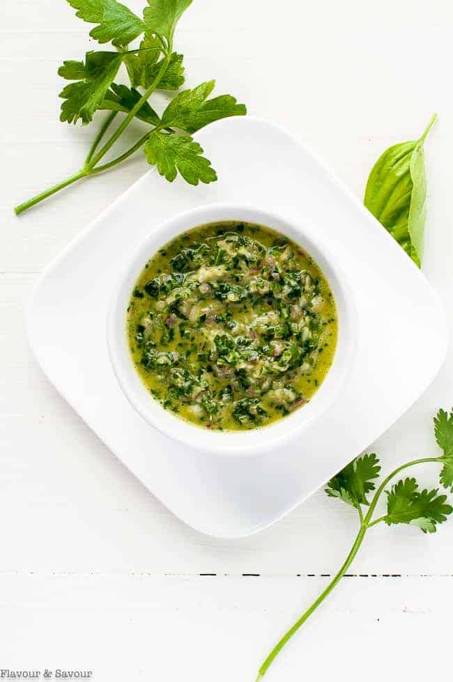 Chimichurri Sauce in a white bowl ready for Chimichurri Shrimp Skewers