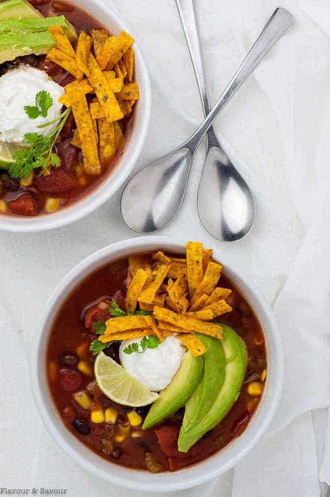 Slow Cooker Vegetarian Texas Black Bean Soup overhead view of 2 bowls