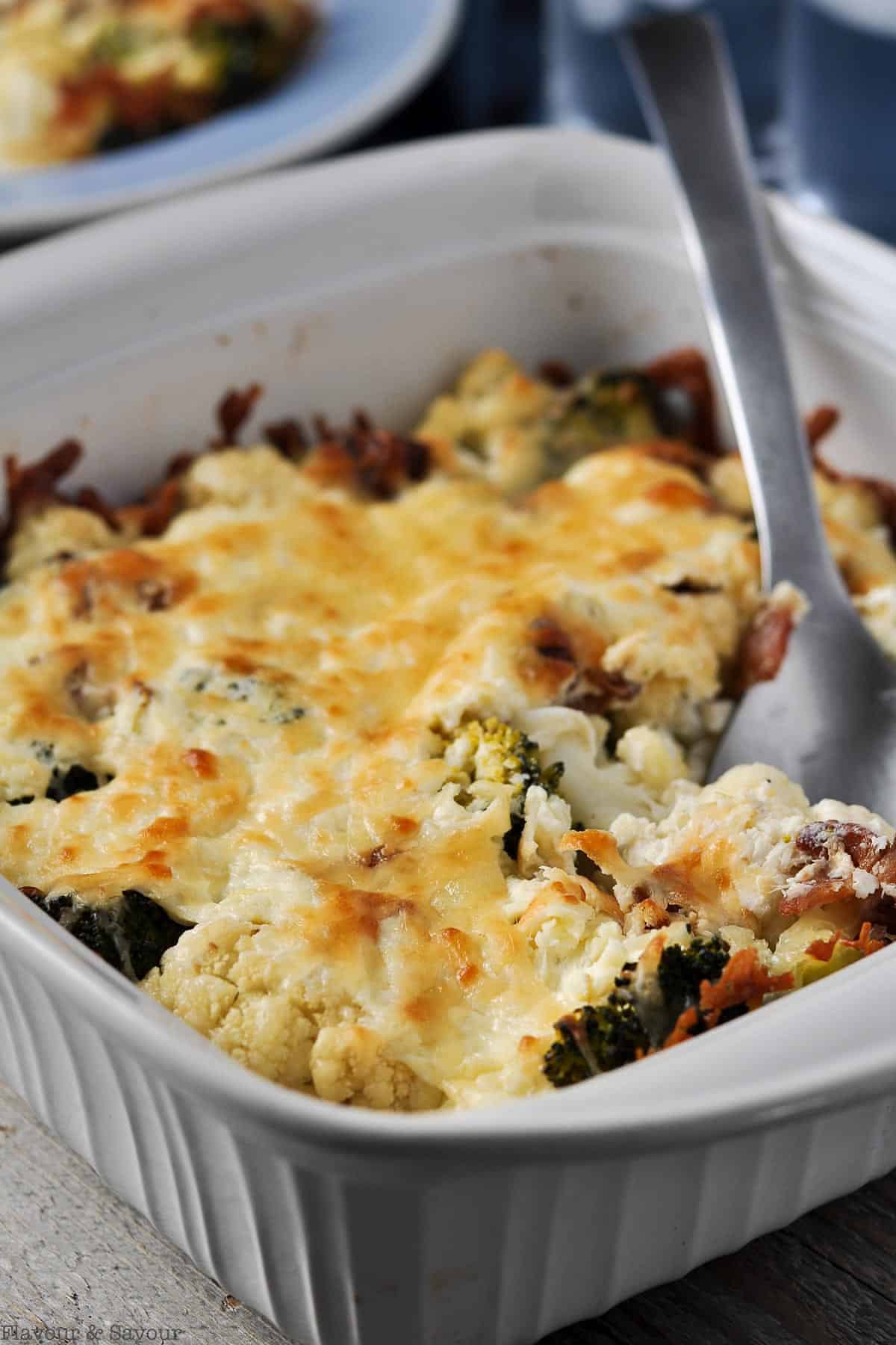 Low Carb Broccoli Cauliflower Casserole in a white serving dish