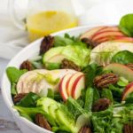 Fennel Apple Chicken Salad with a a jug of dressing