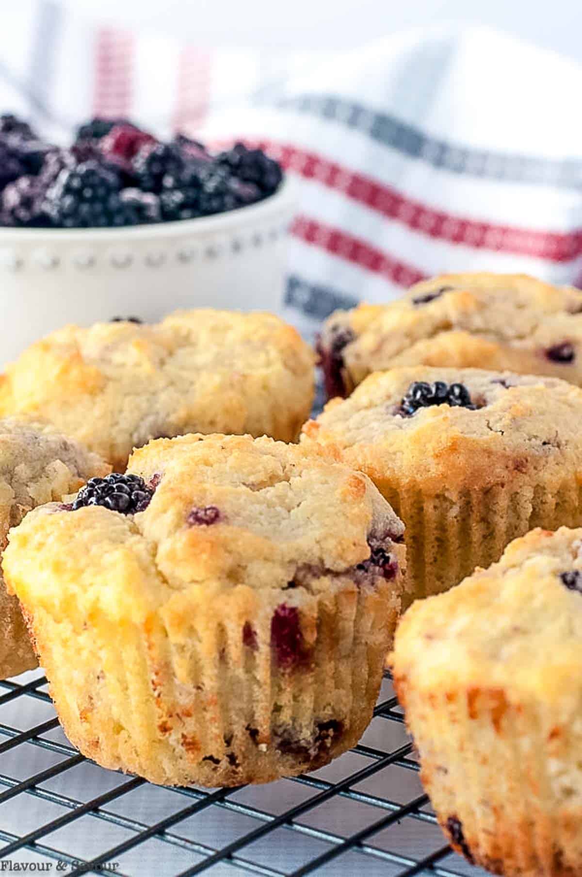 Keto Blackberry Muffins on a cooling rack.