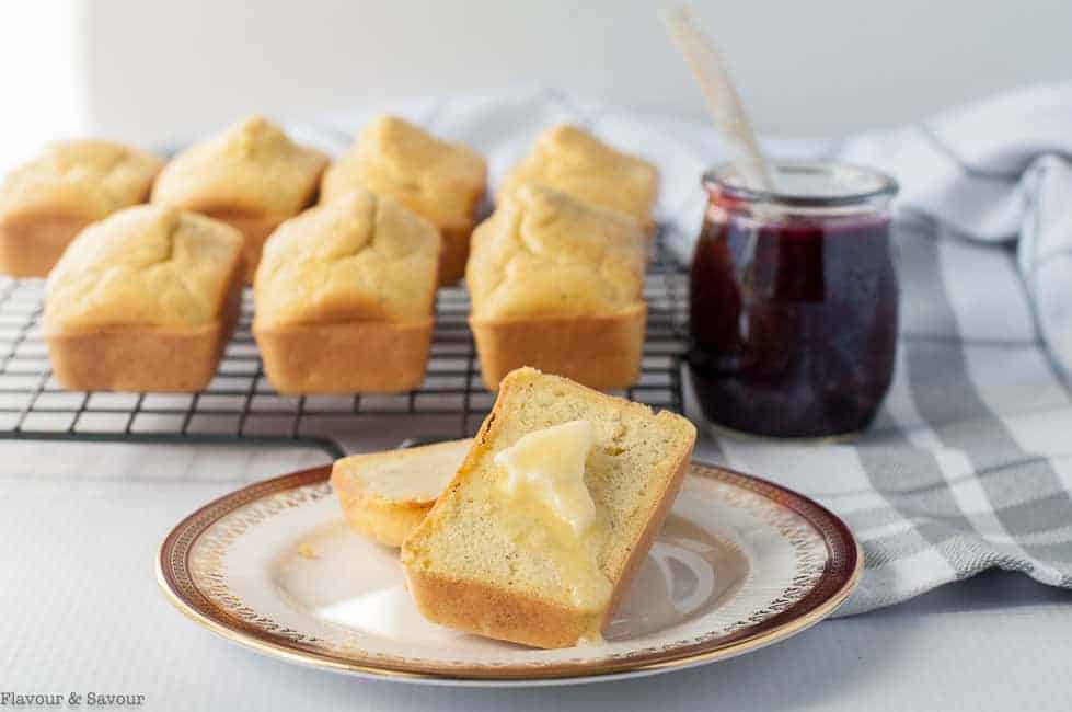 Super Easy Low-Carb Keto Mini Buns on a cooling rack served with butter and chia jam