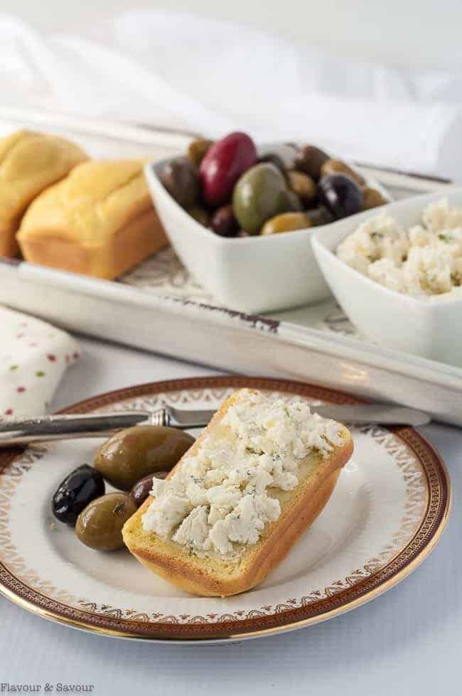 Keto Low-Carb Mini Loaves served with cream cheese and olives.