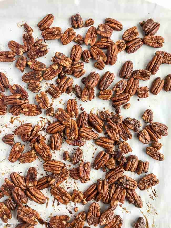 Low-Carb Pumpkin Spice Roasted Pecans out of the oven on a baking sheet