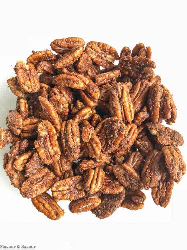 Low-Carb Pumpkin Spice Roasted Pecans in a bowl ready for the oven