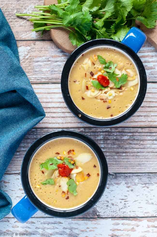 Two bowls of Slow Cooker Moroccan Harissa Cauliflower Soup