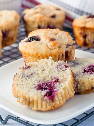 Ultra Moist Keto Blackberry Muffins cut in half