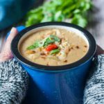Holding a warm mug of Slow Cooke Moroccan Harissa Cauliflower Soup