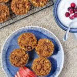 Overhead view of baked oatmeal cups and yogurt