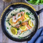 Creamy Lemon Salmon Piccata in a cast iron pan