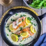 Creamy Lemon Salmon Piccata in a cast iron skillet