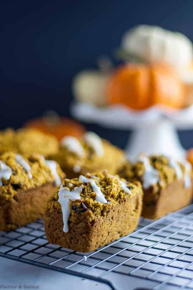 Loaves of Mini Gluten Free Pumpkin Bread on a cooling rack