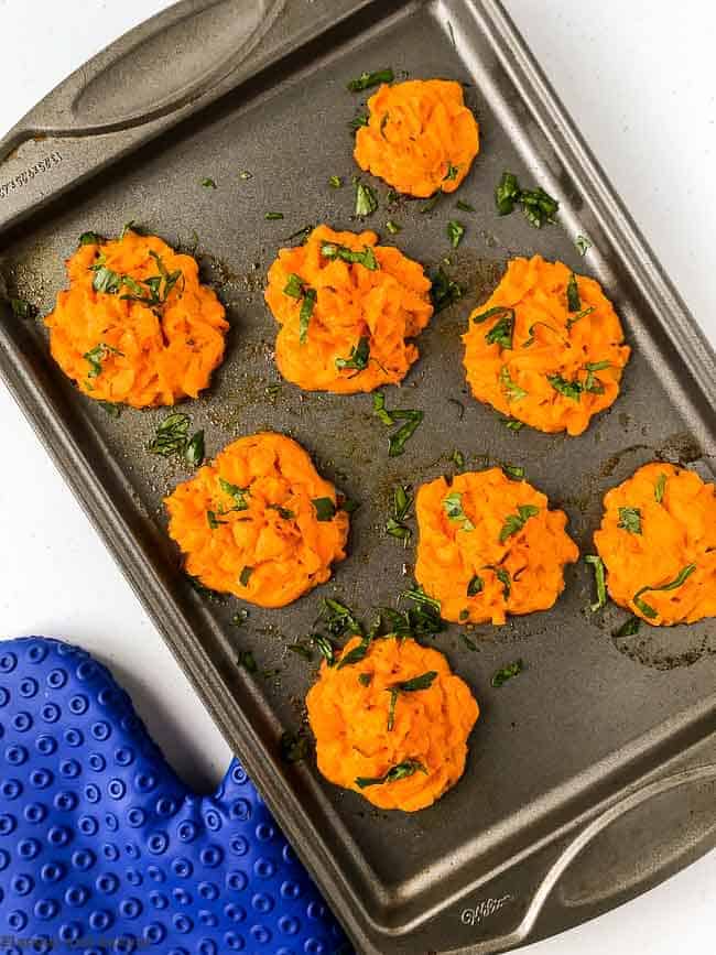 Make-Ahead Duchess Sweet Potatoes on a baking sheet.