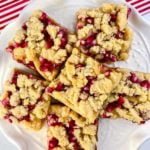 Pomegranate Apple Crumble Bars on a white plate