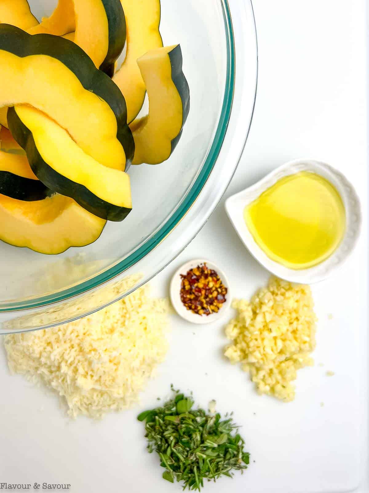 Prepared ingredients for garlic parmesan roasted acorn squash.