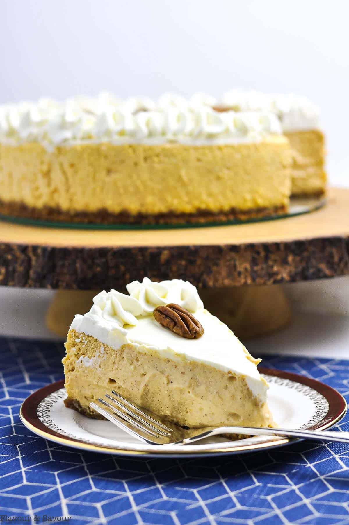 side view of a slice of pumpkin cheesecake