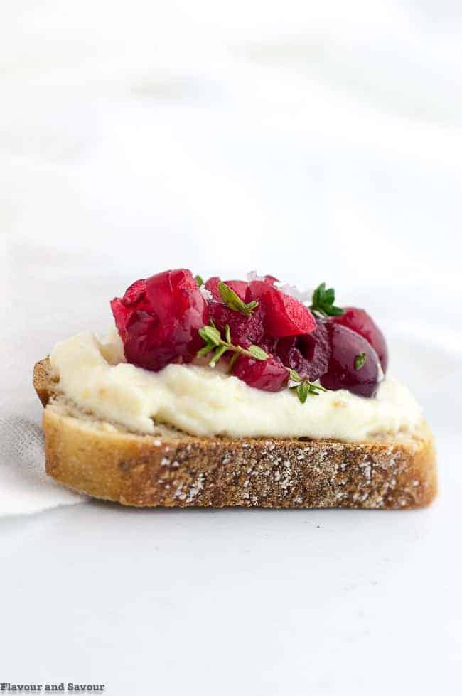 Cranberry Whipped Ricotta Crostini with Thyme leaves