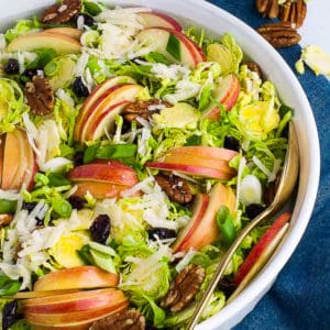 Overhead view of Shaved Brussels Sprout Salad with sliced apples