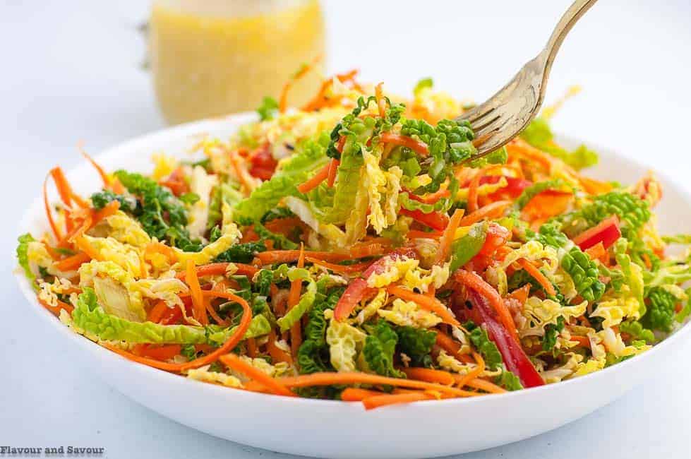 A forkful of Crunchy Cabbage Coleslaw with Sesame Miso Dressing