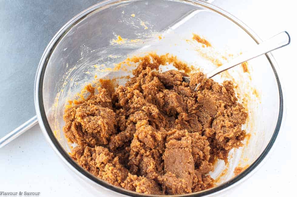 Mixing cookie dough with a spoon