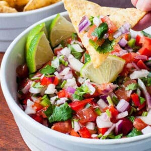 a scoop of fresh salsa on a tortilla chip