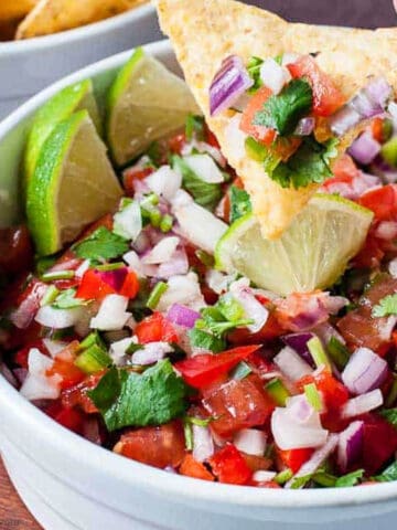 a scoop of fresh salsa on a tortilla chip