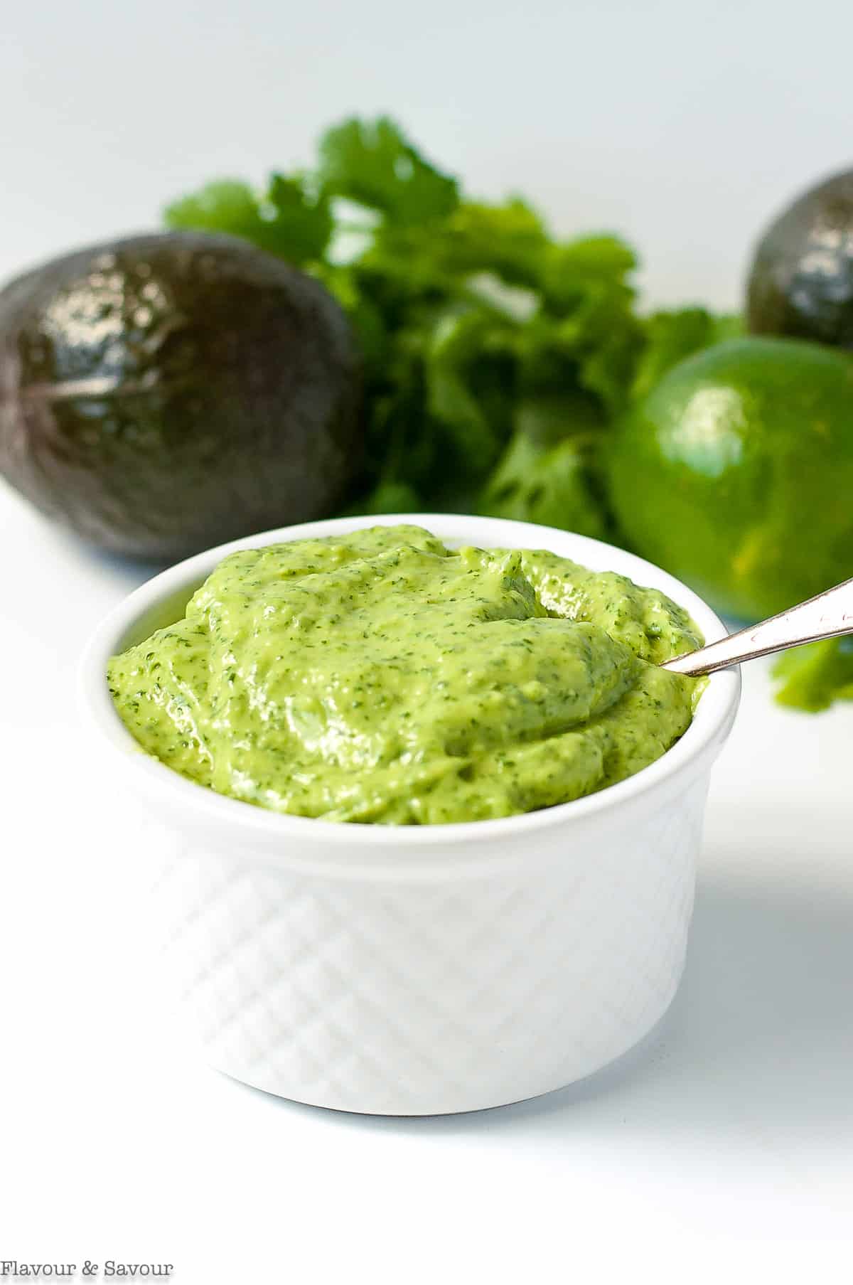 Avocado crema in a small serving bowl.