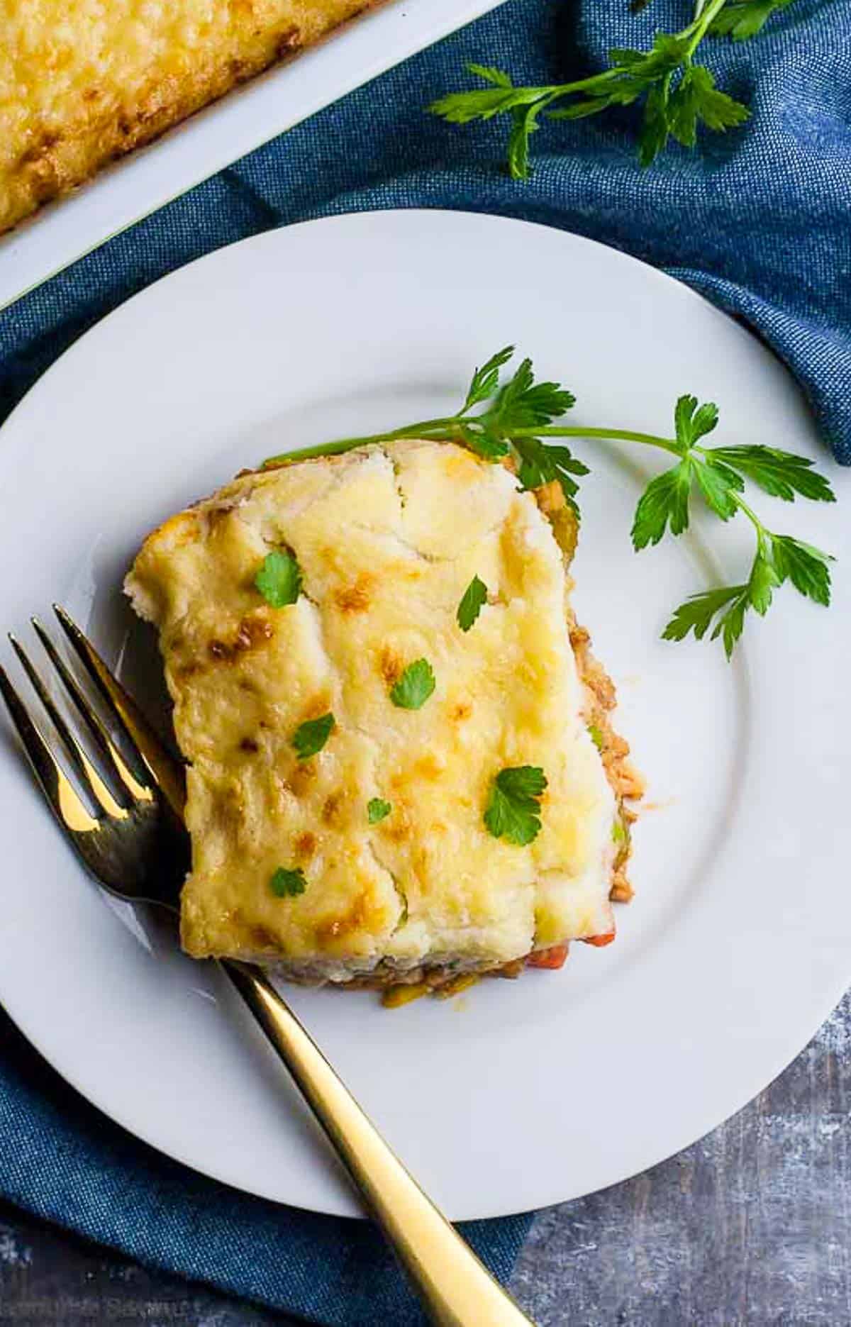 Overhead view of a slice of Shepherd's Pie with mashed cauliflower crust.