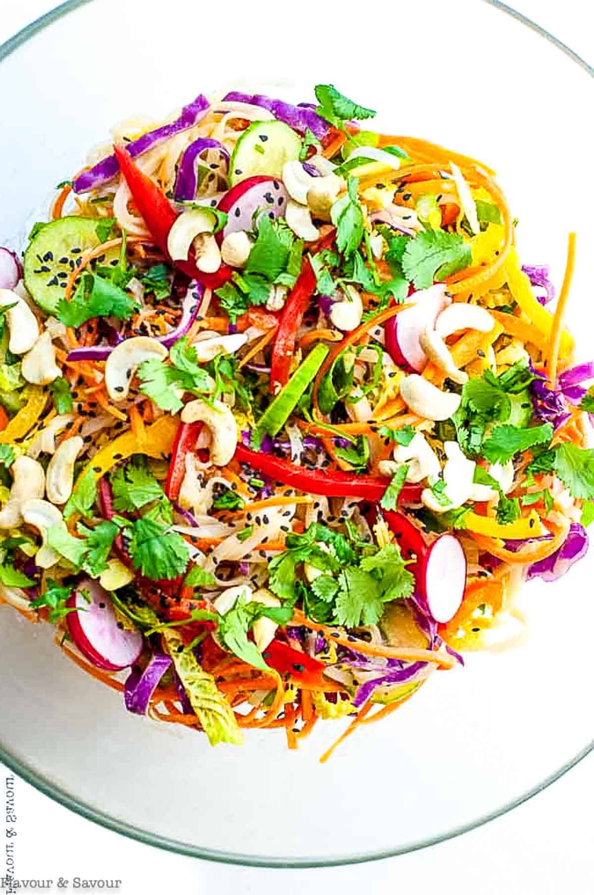 Overhead view of a bowl of crunchy Thai Noodle Salad with Peanut Sauce Dressing.