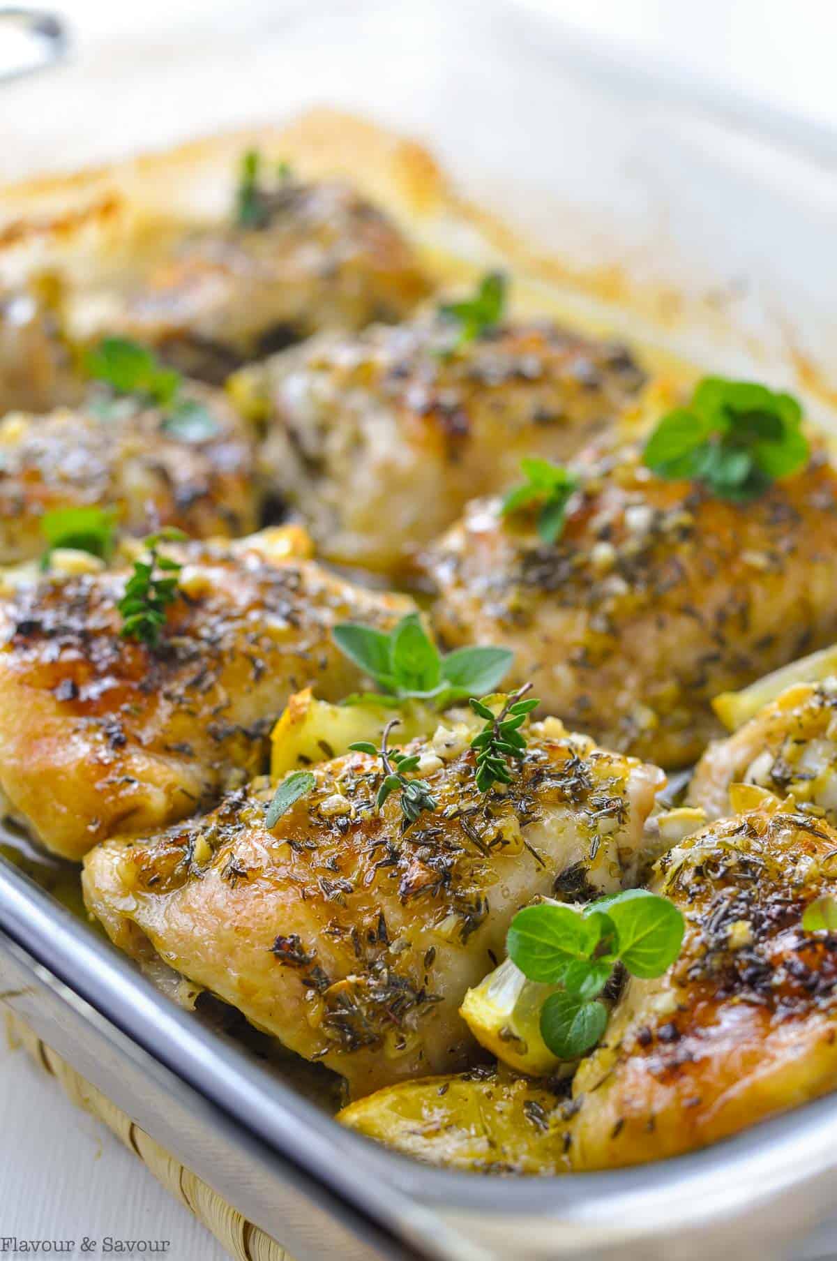 Easy Baked Lemon Chicken thighs in a baking dish