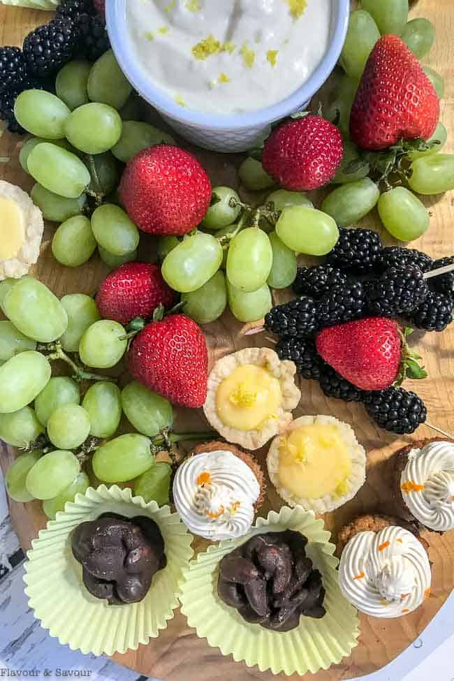 Dessert Fruit Platter with mini desserts, grapes, strawberries and blackberries