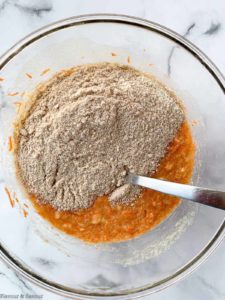 add dry ingredients to wet ingredients to make gluten-free carrot cake cupcakes