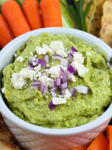 Close up view of Avocado Feta Herb Dip