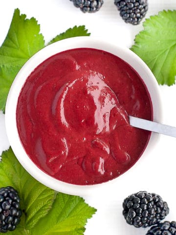 Blackberry Balsamic Dressing in a white bowl overhead view