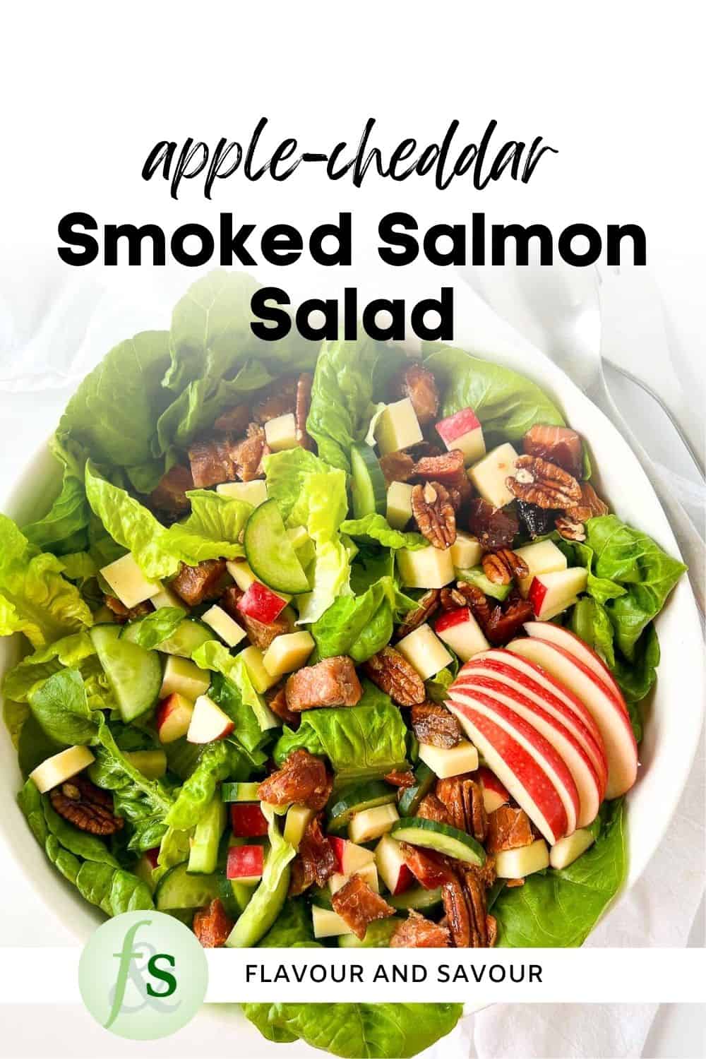 Image with text for apple cheddar smoked salmon salad.