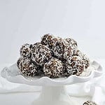 No Bake Chocolate Almond Snowballs on a white serving dish