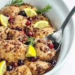 Spooning out Cranberry Rosemary Boneless Chicken