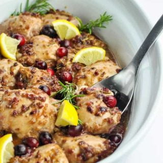 Spooning out Cranberry Rosemary Boneless Chicken
