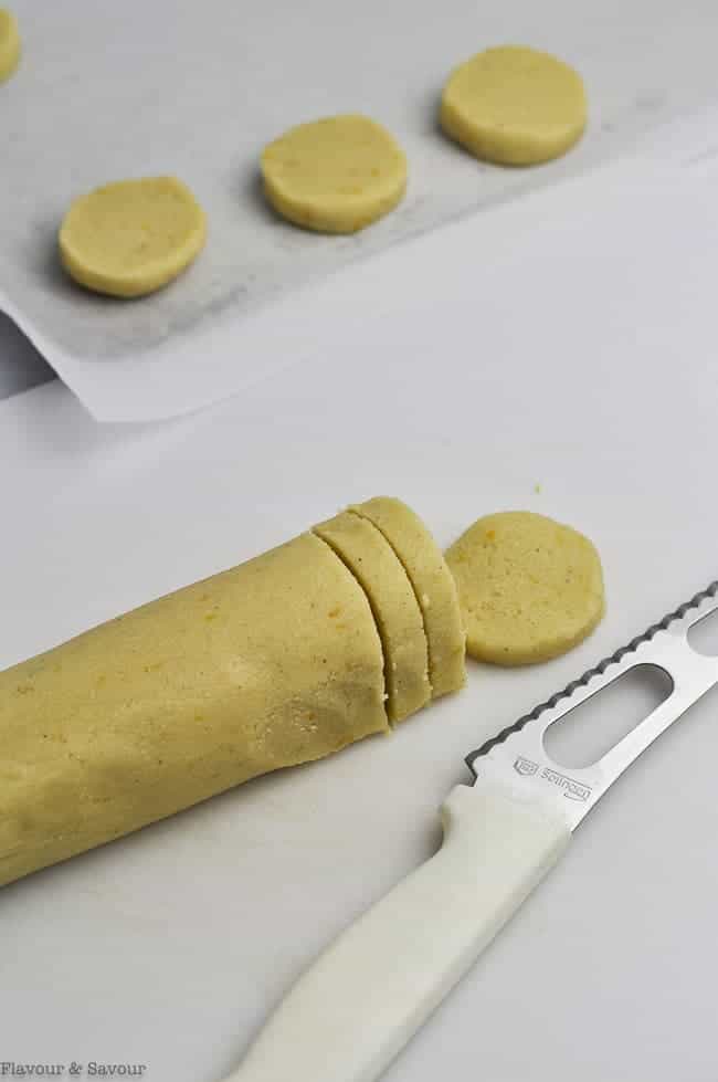 Slicing dough for slice and bake rolled cookies