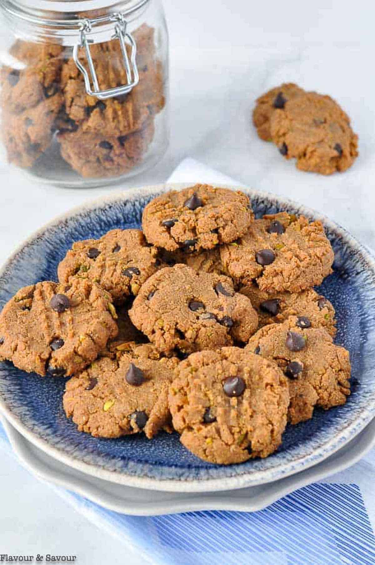 Sugar-free almond butter chocolate chip cookies on a plate.