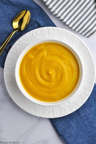 A bowl of Butternut Squash Soup with no garnish.